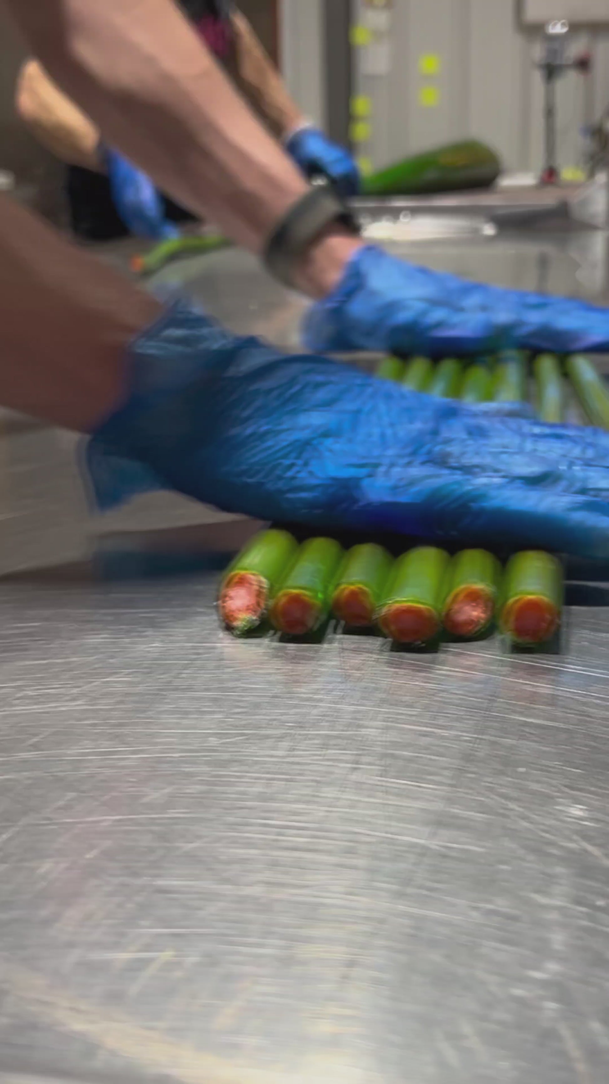 Sticky's Fruit Mix candy designs being cut and mixed by candy artisans