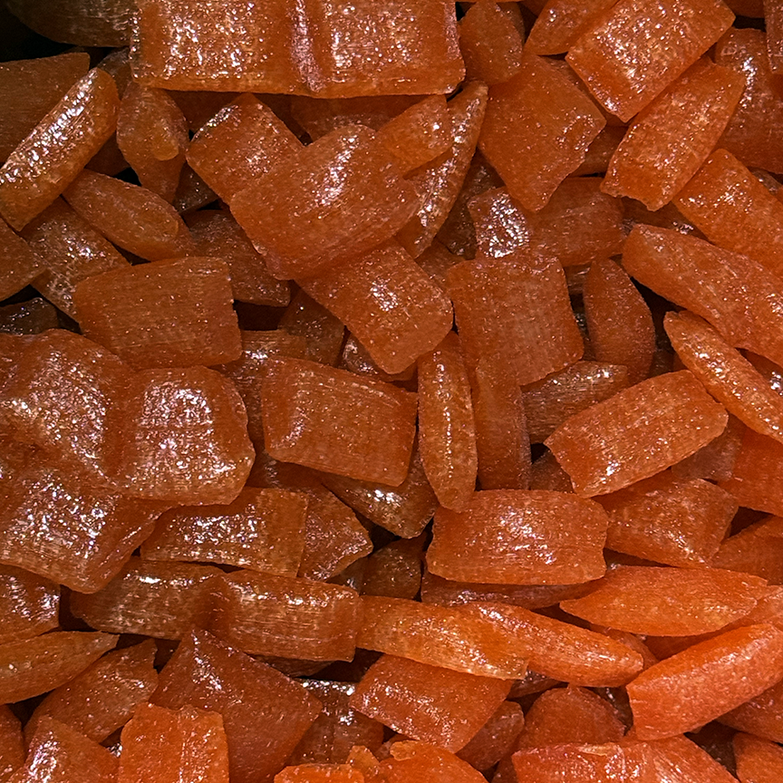 pieces of Sticky's delicious Acid Drop Orange candies