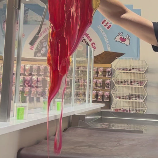 candy artisans making a batch of Sticky's Watermelon candy 