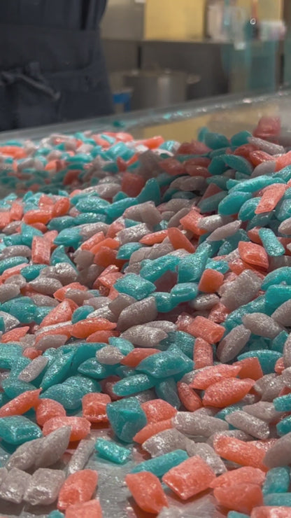 Sticky's candy artisans making a batch of Acid Drops 2.0 candy pillows