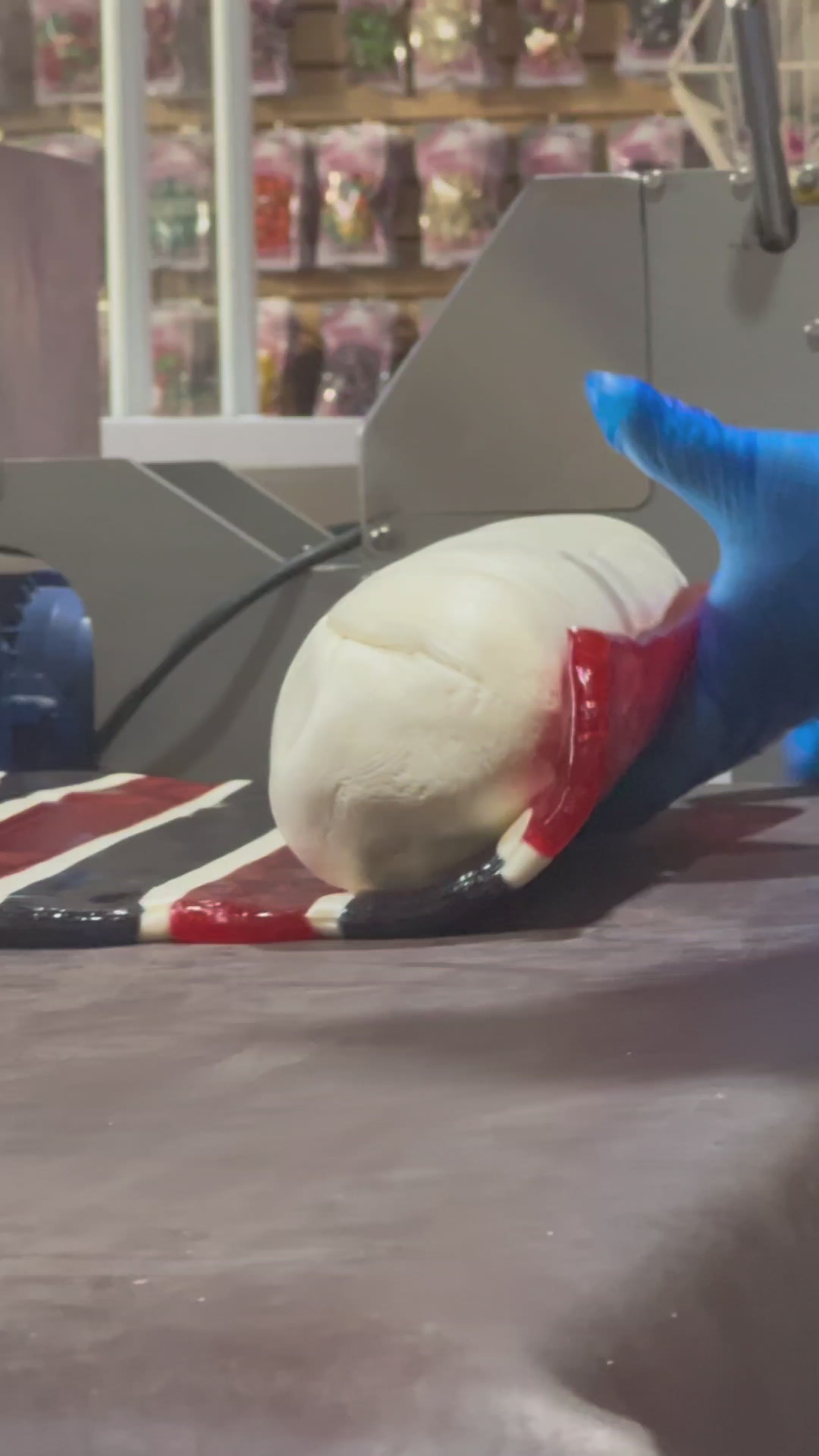 Load video: Sticky&#39;s candy artisans making a batch of Raspberry Lemonade candy pillows