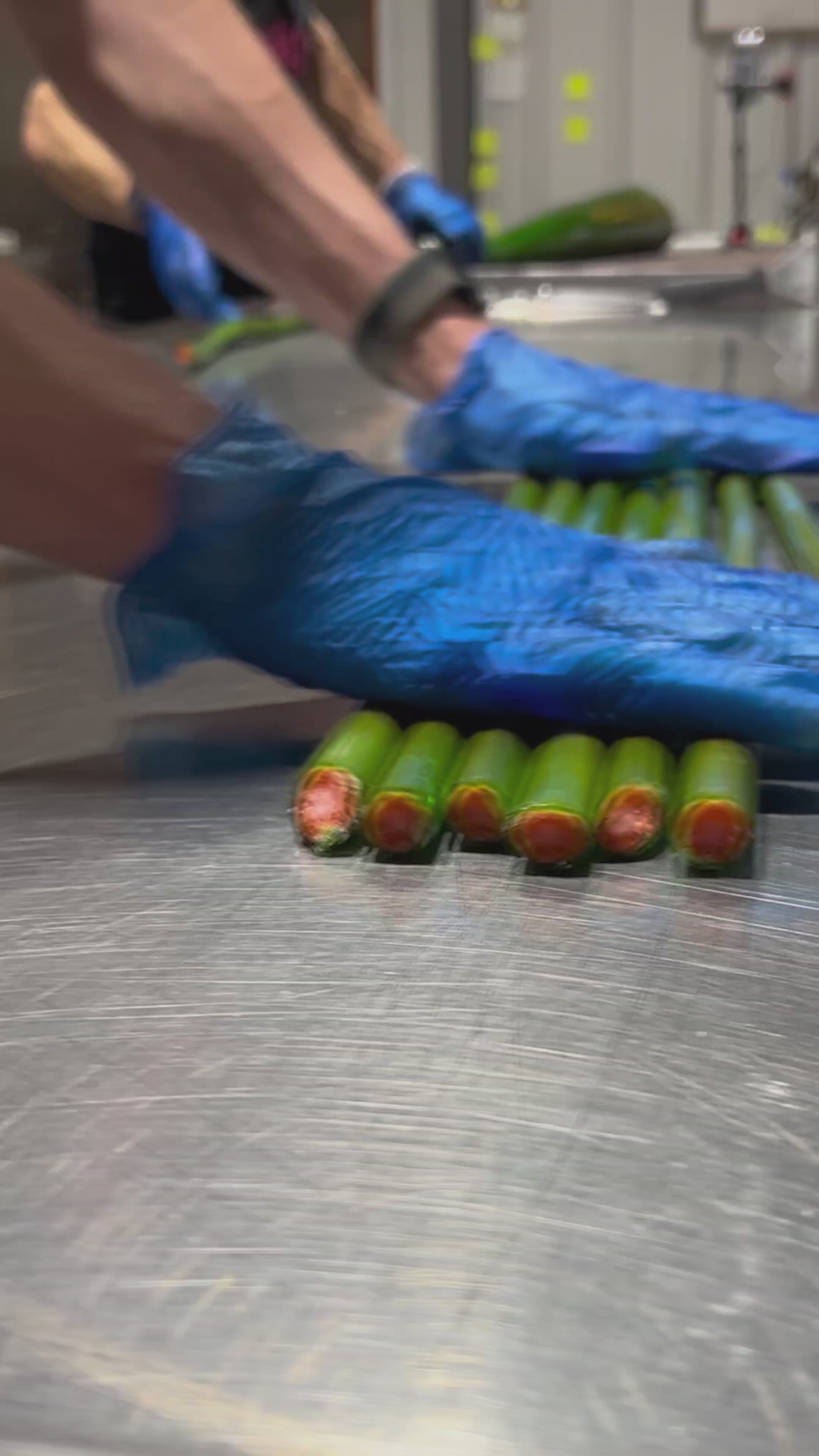Load video: Sticky&#39;s Fruit Mix candy designs being cut and mixed by candy artisans