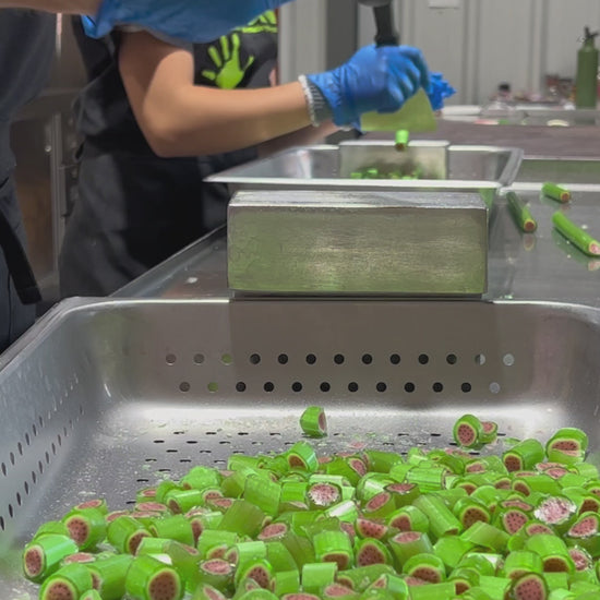 Sticky's candy artisans making a batch of Sour Watermelon candy