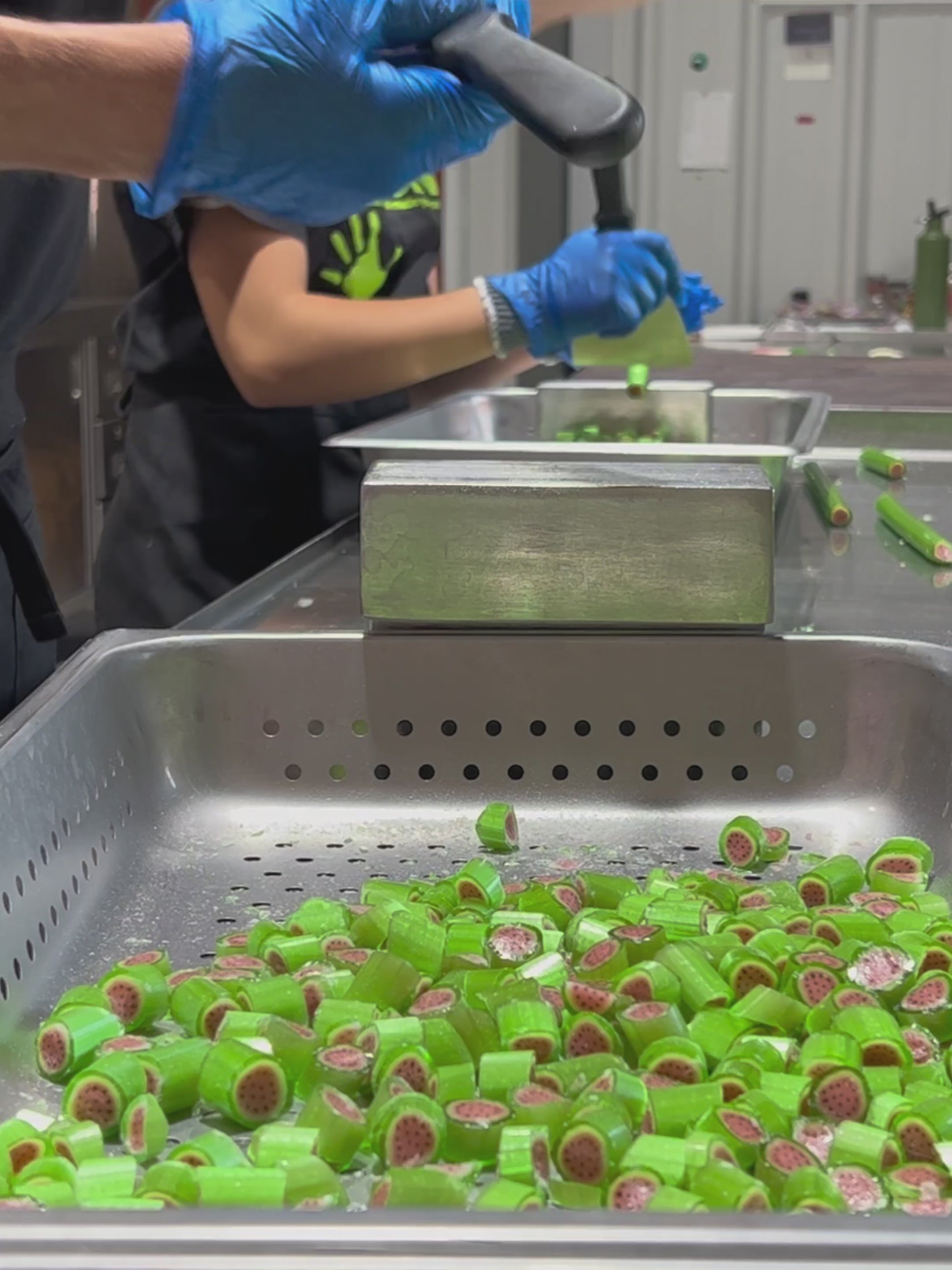 Sticky's candy artisans making a batch of Sour Watermelon candy