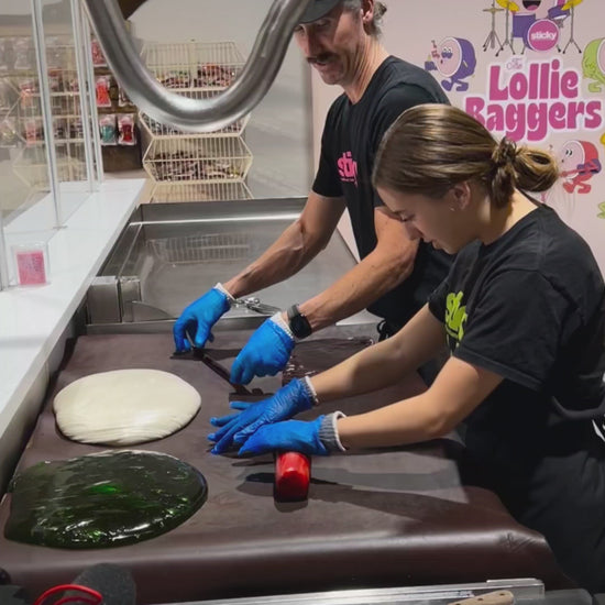 traditional candy artisans making Sticky's Apple candy