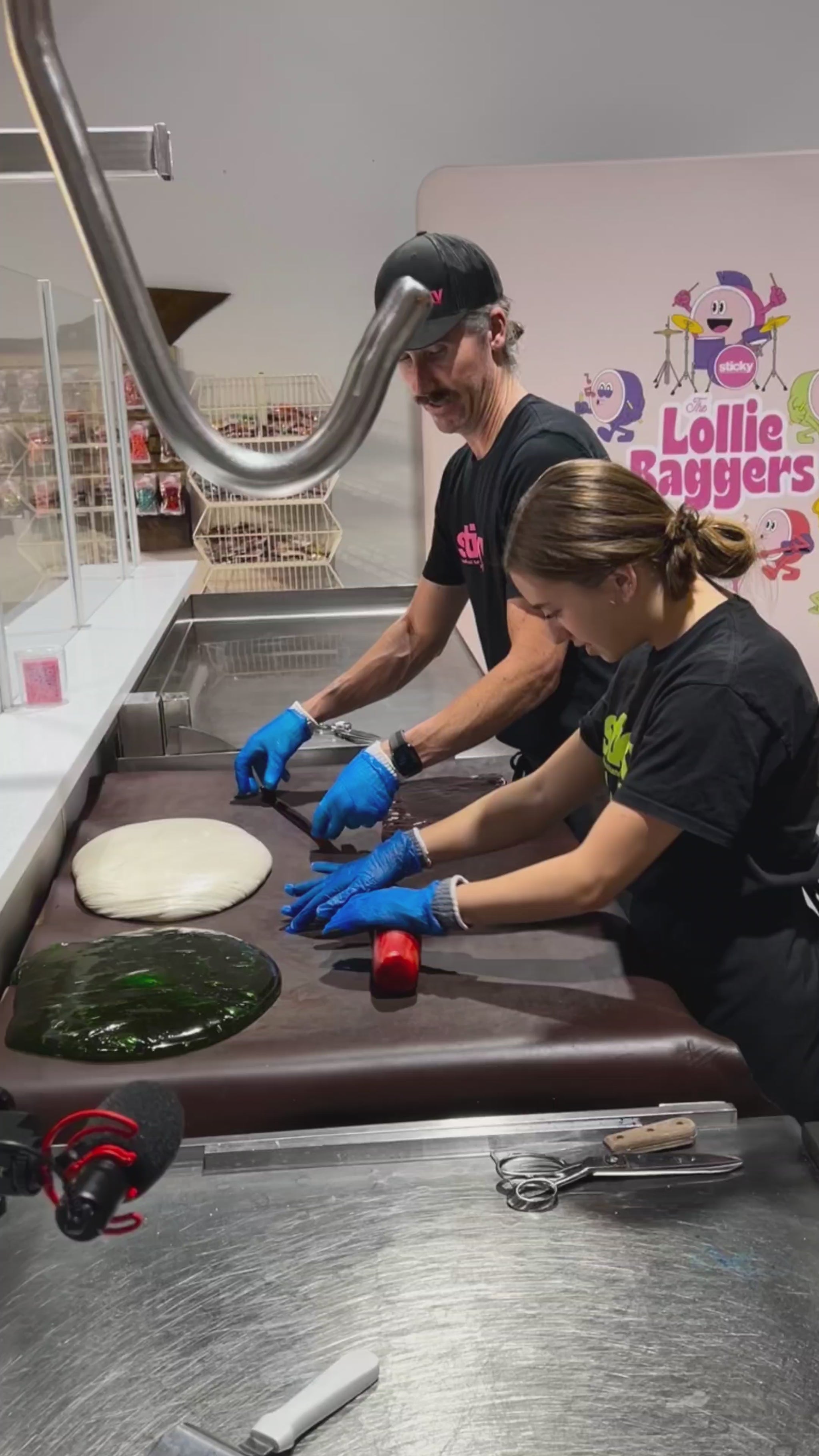 traditional candy artisans making Sticky's Apple candy