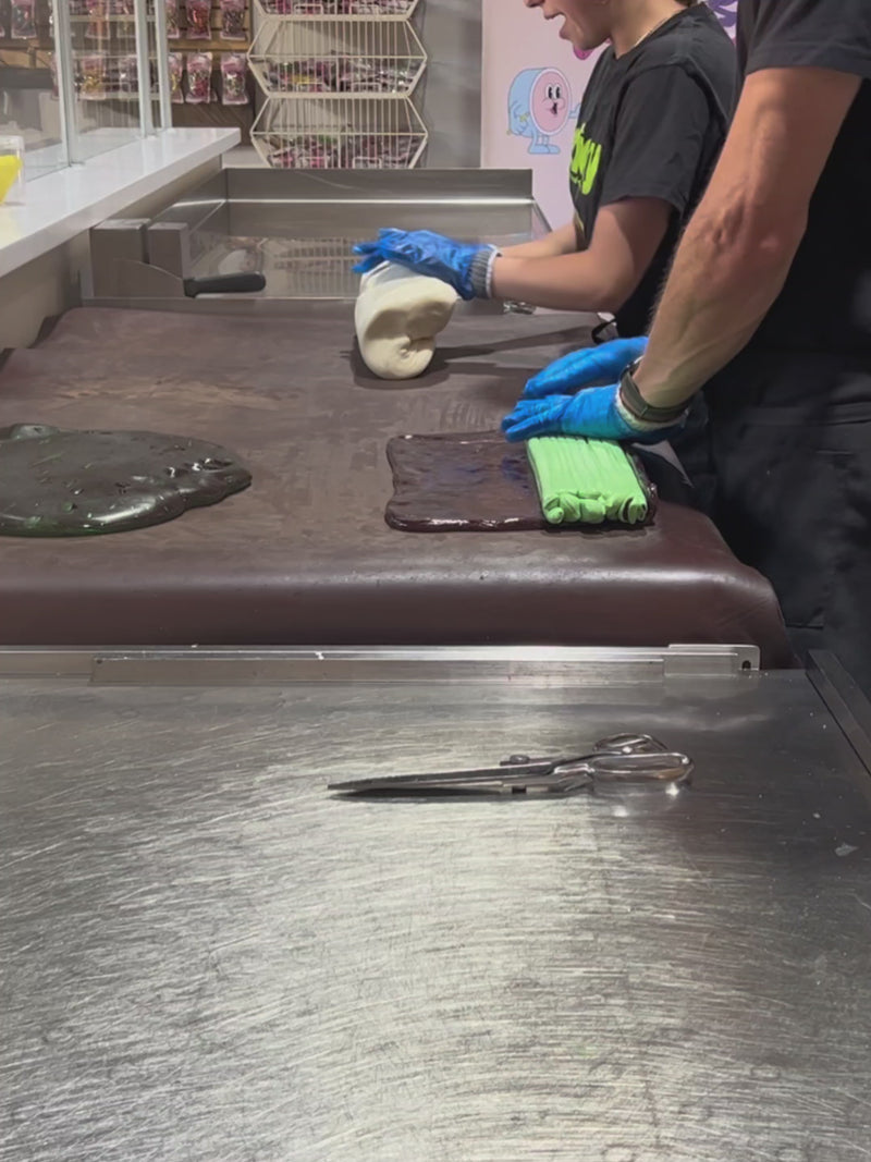 traditional candy artisans making Sticky's Pickle candy