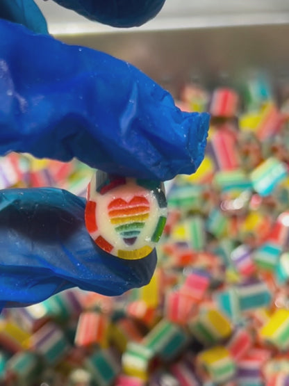 Sticky's candy artisans making a batch of Rainbow Hearts candy