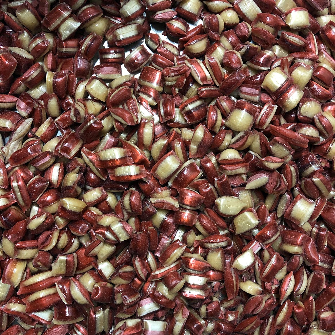 pieces of Sticky's handcrafted sour cherry cola candy